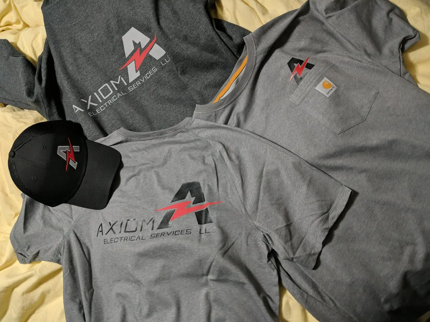 Axiom electrician with the service truck and trailer